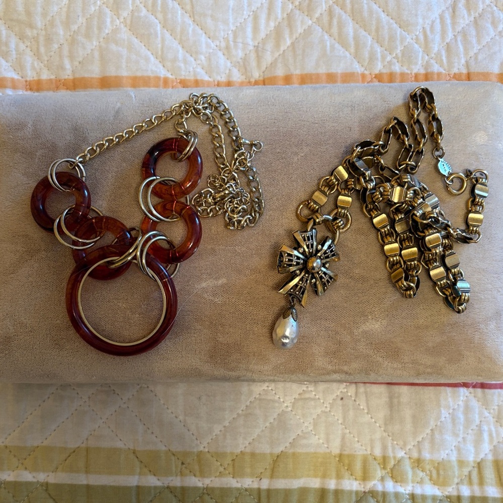Vintage gold tone and tortoise necklaces.